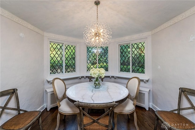 1500 Ridgeway Rd, Oakwood, OH 45419 - dining room featuring a chandelier, wood finished floors, baseboards, and radiator