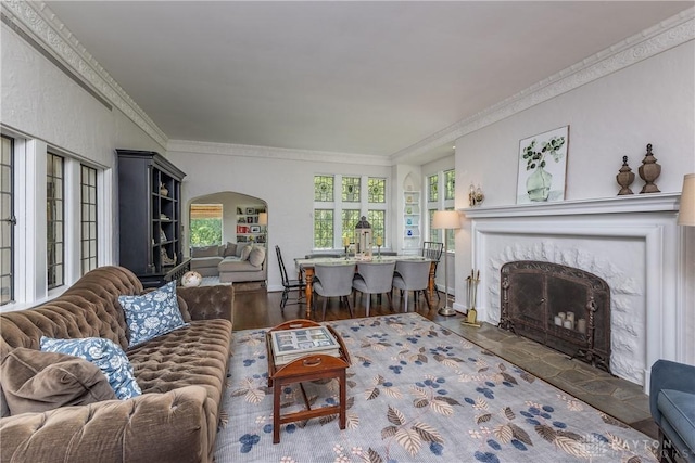1500 Ridgeway Rd, Oakwood, OH 45419 - living area featuring a fireplace, crown molding, and arched walkways