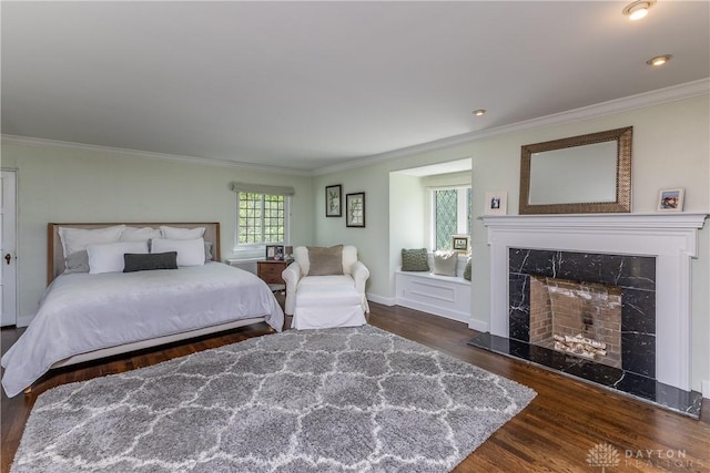 1500 Ridgeway Rd, Oakwood, OH 45419 - bedroom with wood finished floors, ornamental molding, a fireplace, and baseboards