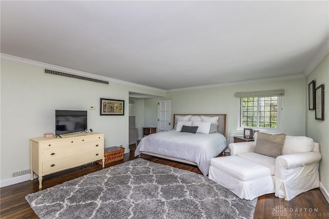 1500 Ridgeway Rd, Oakwood, OH 45419 - bedroom featuring crown molding, dark wood-style flooring, and baseboards