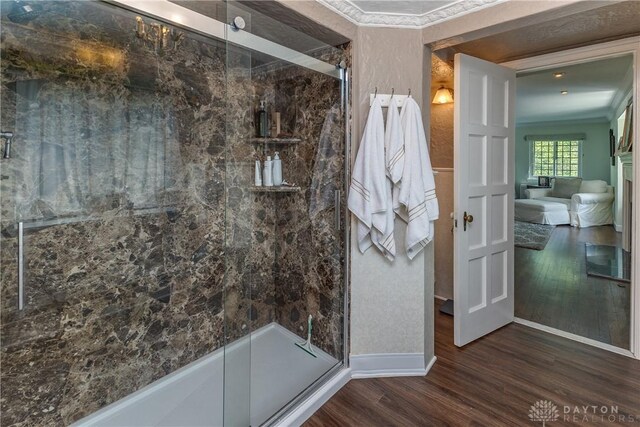1500 Ridgeway Rd, Oakwood, OH 45419 - bathroom with a shower stall, crown molding, wood finished floors, and baseboards