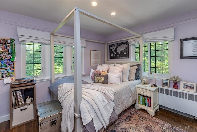 1500 Ridgeway Rd, Oakwood, OH 45419 - bedroom featuring radiator heating unit, wood finished floors, and recessed lighting