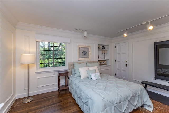 1500 Ridgeway Rd, Oakwood, OH 45419 - bedroom with track lighting, dark wood-type flooring, ornamental molding, and baseboards