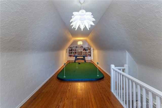 1500 Ridgeway Rd, Oakwood, OH 45419 - playroom with a textured wall, wood finished floors, baseboards, and vaulted ceiling