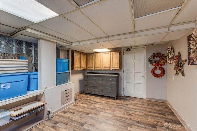 1500 Ridgeway Rd, Oakwood, OH 45419 - kitchen featuring light wood-style floors, baseboards, and brown cabinets