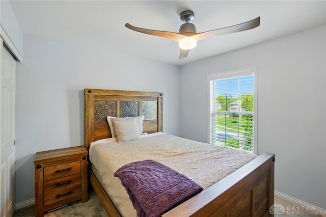 10041 Meadow Woods Ln, Washington Twp, OH 45458 - bedroom with a closet, baseboards, a ceiling fan, and light colored carpet