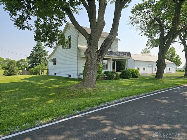 383 Georgetown Verona Rd, West Manchester, OH 45382 - view of side of property with a yard