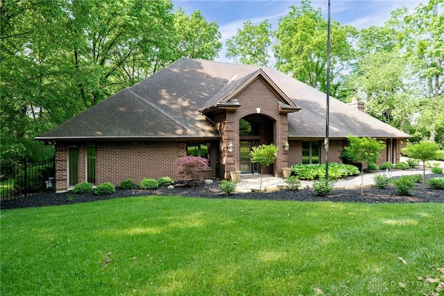 1211 Runnymede Rd, Oakwood, OH 45419 - view of front of property with brick siding, a chimney, and a shingled roof