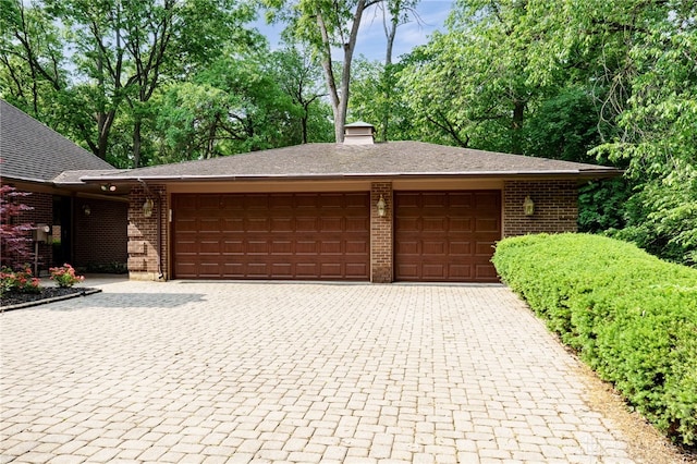 1211 Runnymede Rd, Oakwood, OH 45419 - garage featuring decorative driveway