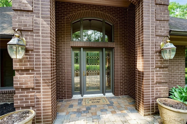 1211 Runnymede Rd, Oakwood, OH 45419 - view of exterior entry with brick siding and french doors