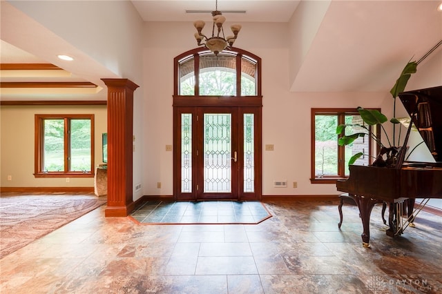 1211 Runnymede Rd, Oakwood, OH 45419 - entrance foyer with plenty of natural light, baseboards, and ornate columns