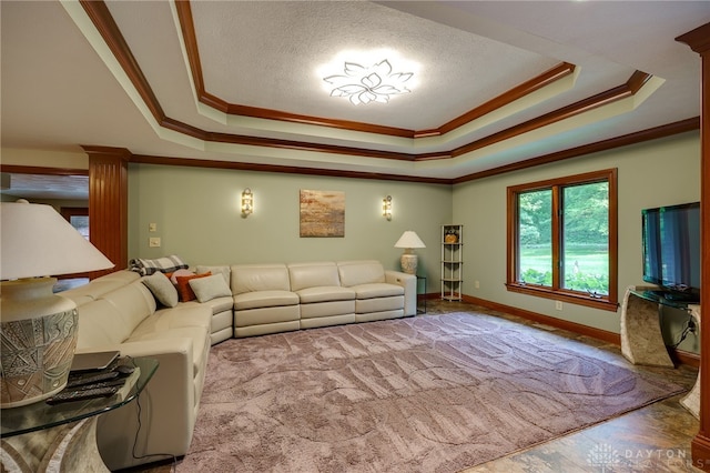 1211 Runnymede Rd, Oakwood, OH 45419 - living room with ornamental molding, a raised ceiling, decorative columns, and baseboards