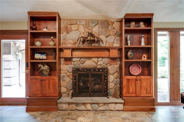 1211 Runnymede Rd, Oakwood, OH 45419 - unfurnished living room with a stone fireplace