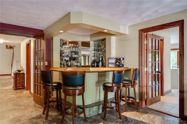 1211 Runnymede Rd, Oakwood, OH 45419 - indoor bar featuring baseboards and stone finish floors