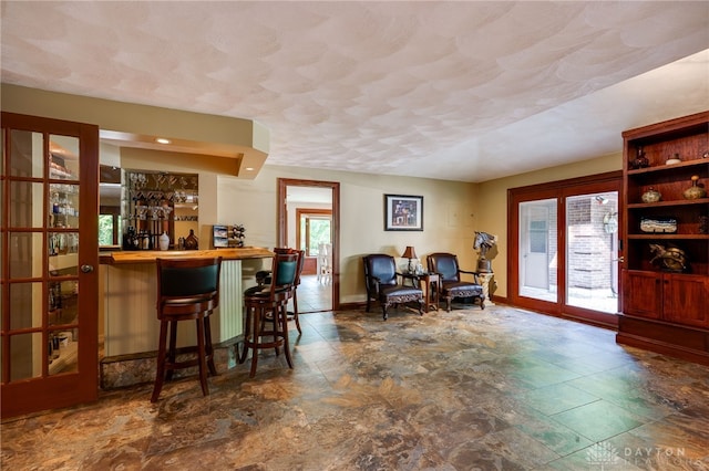 1211 Runnymede Rd, Oakwood, OH 45419 - indoor dry bar with stone finish flooring and baseboards