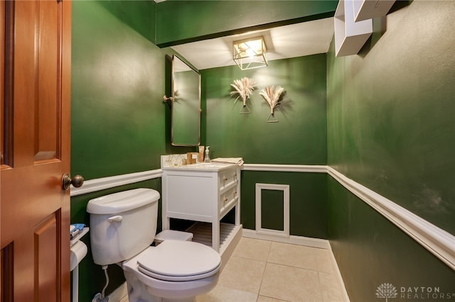 1211 Runnymede Rd, Oakwood, OH 45419 - half bath with tile patterned floors, toilet, vanity, and baseboards