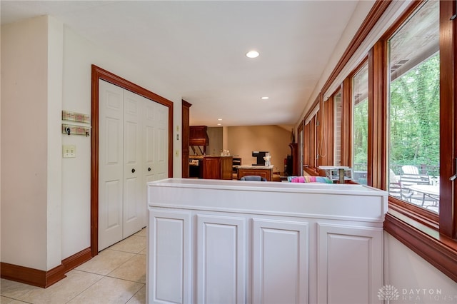 1211 Runnymede Rd, Oakwood, OH 45419 - kitchen featuring light tile patterned flooring, recessed lighting, baseboards, white cabinets, and light countertops