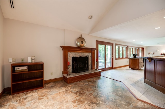1211 Runnymede Rd, Oakwood, OH 45419 - living area featuring a high end fireplace, baseboards, recessed lighting, and lofted ceiling