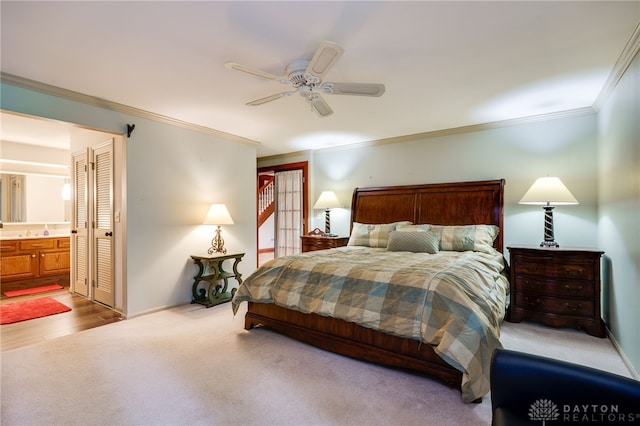 1211 Runnymede Rd, Oakwood, OH 45419 - bedroom featuring ornamental molding, carpet floors, ceiling fan, baseboards, and connected bathroom