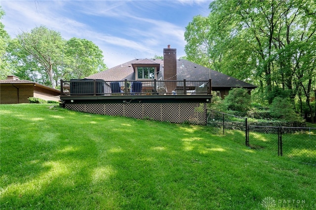 1211 Runnymede Rd, Oakwood, OH 45419 - back of property with a wooden deck and a chimney