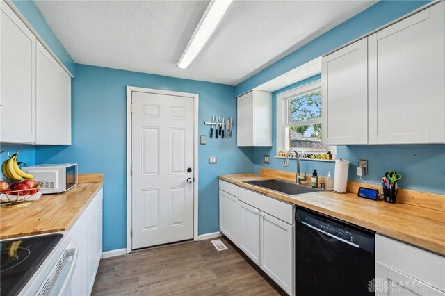 813 Ridge Rd, Englewood, OH 45322 - kitchen featuring white appliances, wood counters, a sink, and dark wood-style floors