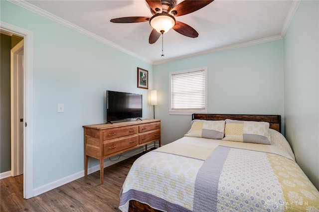 613 Spinning Rd, New Carlisle, OH 45344 - bedroom with wood finished floors, ornamental molding, baseboards, and a ceiling fan