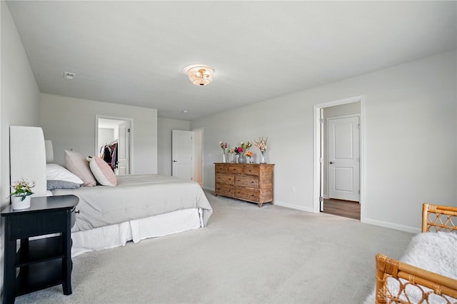 2550 Bellevue Dr, Batavia, OH 45103 - carpeted bedroom with baseboards and a walk in closet