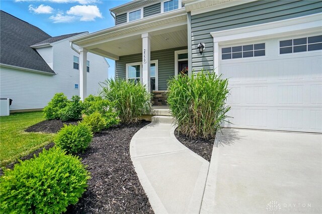 2550 Bellevue Dr, Batavia, OH 45103 - view of exterior entry with a porch