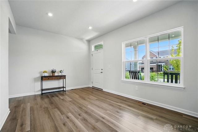 2550 Bellevue Dr, Batavia, OH 45103 - foyer with healthy amount of natural light, wood finished floors, baseboards, and recessed lighting