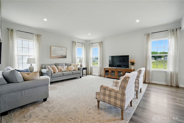 2550 Bellevue Dr, Batavia, OH 45103 - living area with wood finished floors, recessed lighting, and baseboards