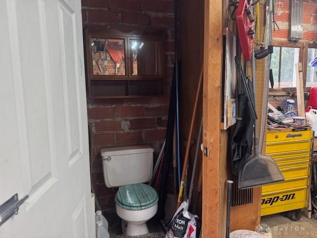 224 S Wolf Creek St, Brookville, OH 45309 - bathroom featuring toilet