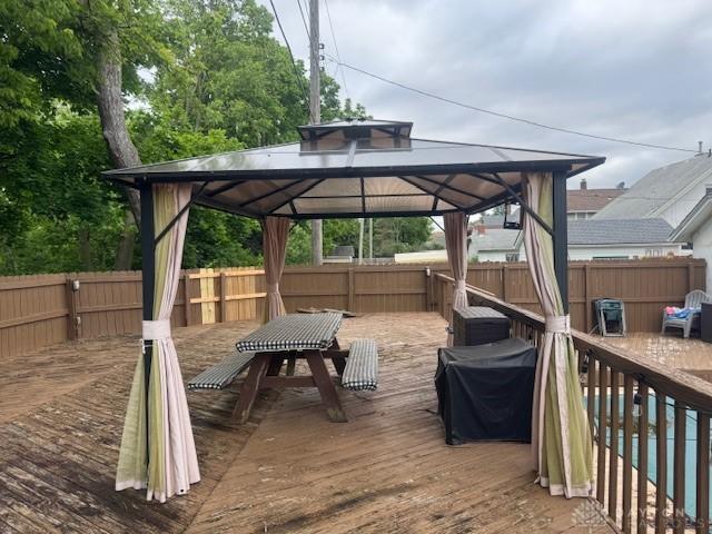 224 S Wolf Creek St, Brookville, OH 45309 - wooden terrace featuring a gazebo and grilling area