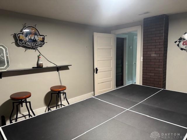 224 S Wolf Creek St, Brookville, OH 45309 - game room featuring baseboards