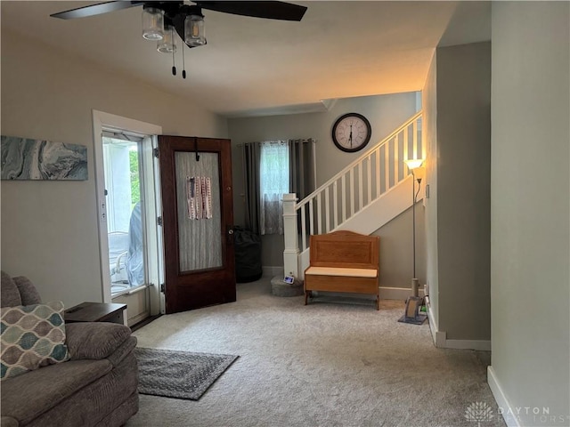 224 S Wolf Creek St, Brookville, OH 45309 - carpeted foyer entrance with ceiling fan, stairway, and baseboards