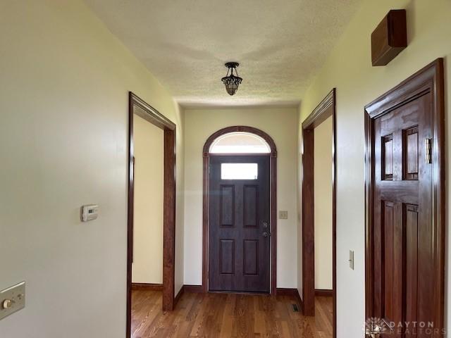 5671 Sonora Rd, Lewisburg, OH 45338 - entryway featuring wood finished floors and baseboards