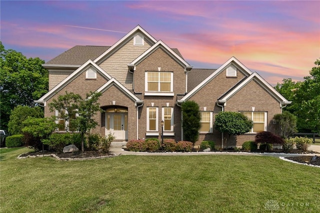 5411 Whispering Brook Ct, Liberty Twp, OH 45011 - view of front of home featuring brick siding and a lawn