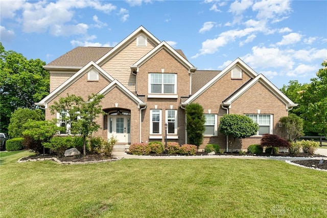 5411 Whispering Brook Ct, Liberty Twp, OH 45011 - traditional-style house with brick siding and a front yard