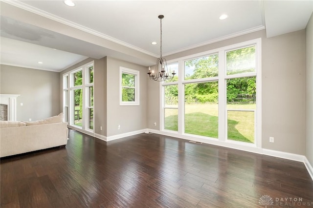 5411 Whispering Brook Ct, Liberty Twp, OH 45011 - unfurnished living room featuring plenty of natural light, a chandelier, hardwood / wood-style floors, baseboards, and ornamental molding