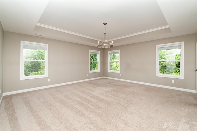 5411 Whispering Brook Ct, Liberty Twp, OH 45011 - spare room featuring a tray ceiling, baseboards, carpet, and ornamental molding