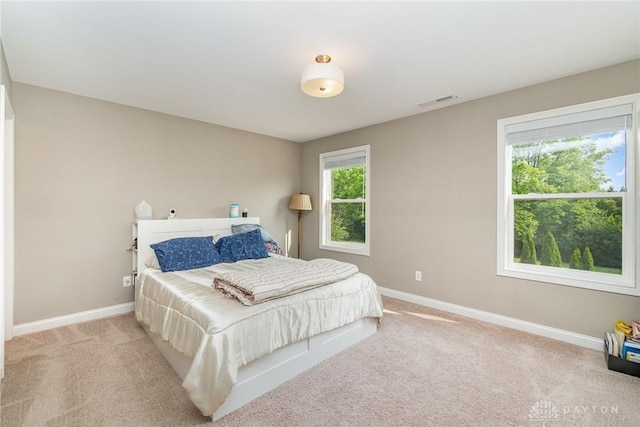5411 Whispering Brook Ct, Liberty Twp, OH 45011 - bedroom with carpet flooring, multiple windows, and baseboards