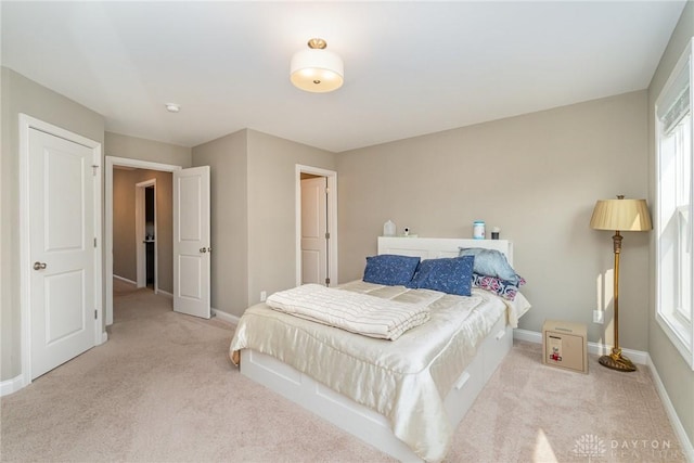 5411 Whispering Brook Ct, Liberty Twp, OH 45011 - bedroom with carpet floors, baseboards, and multiple windows
