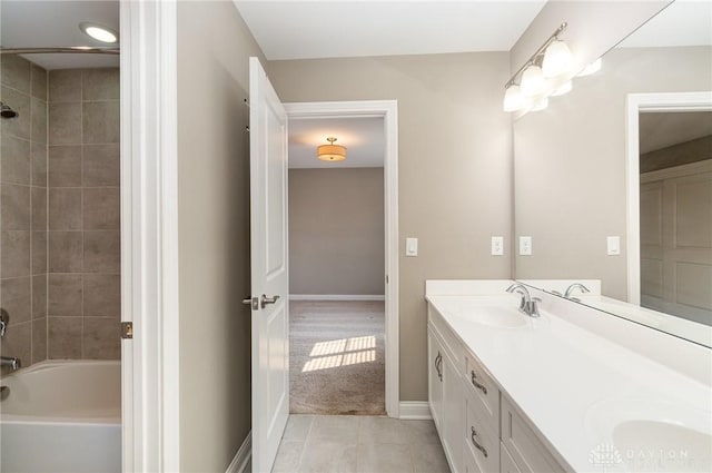 5411 Whispering Brook Ct, Liberty Twp, OH 45011 - bathroom with double vanity, baseboards, tile patterned floors, and shower / washtub combination