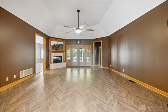 4384 New Market Banta Rd, Lewisburg, OH 45338 - unfurnished living room with ceiling fan, baseboards, a glass covered fireplace, and lofted ceiling