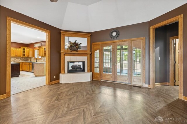 4384 New Market Banta Rd, Lewisburg, OH 45338 - unfurnished living room with baseboards and a tiled fireplace
