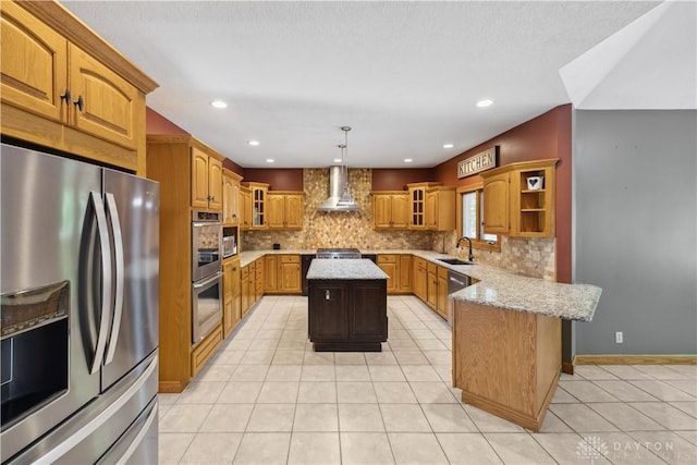 4384 New Market Banta Rd, Lewisburg, OH 45338 - kitchen with appliances with stainless steel finishes, wall chimney range hood, a sink, a peninsula, and light tile patterned flooring