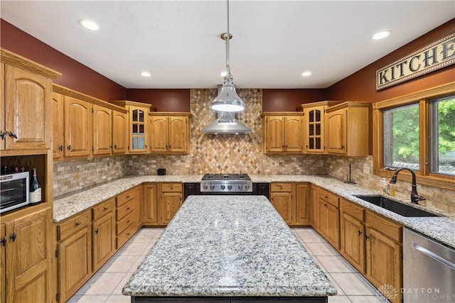 4384 New Market Banta Rd, Lewisburg, OH 45338 - kitchen featuring stainless steel dishwasher, a sink, a kitchen island, range, and backsplash