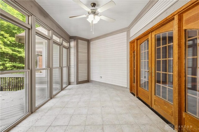 4384 New Market Banta Rd, Lewisburg, OH 45338 - unfurnished sunroom with french doors, ceiling fan, ornamental molding, and wooden walls