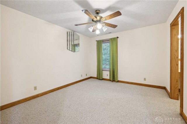 4384 New Market Banta Rd, Lewisburg, OH 45338 - empty room with light carpet, baseboards, and ceiling fan