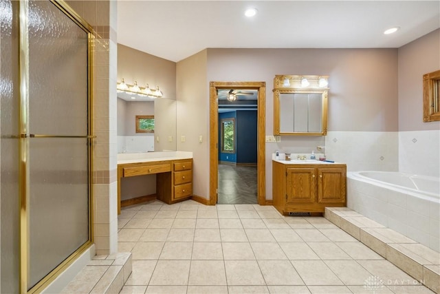 4384 New Market Banta Rd, Lewisburg, OH 45338 - bathroom featuring a stall shower, vanity, a garden tub, tile patterned floors, and recessed lighting