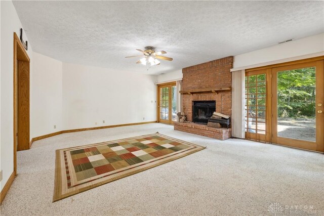4384 New Market Banta Rd, Lewisburg, OH 45338 - unfurnished living room with carpet floors, baseboards, and a textured ceiling